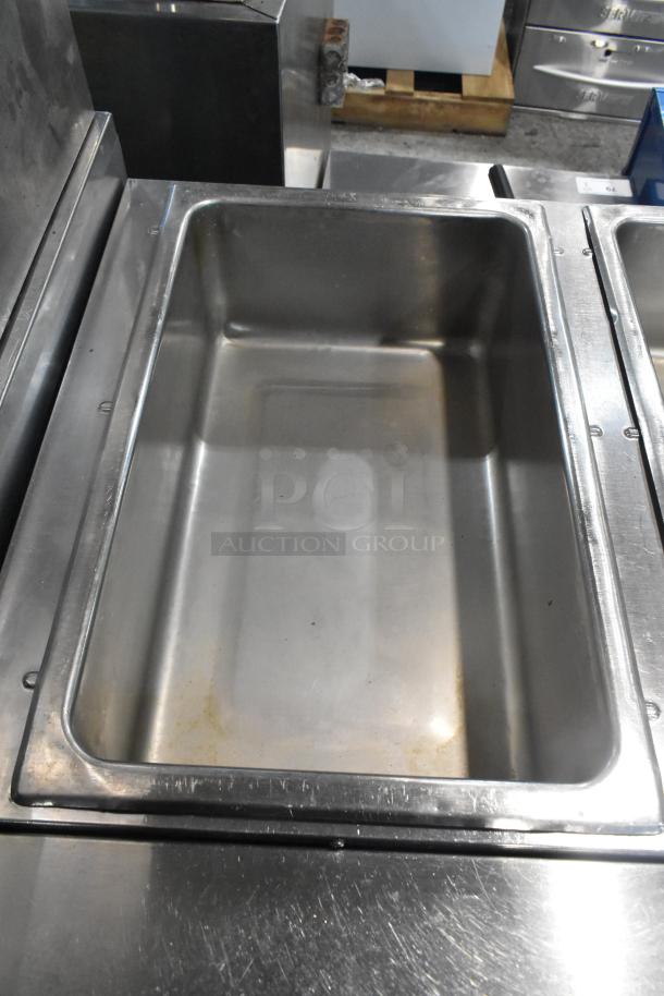 Eagle stainless steel commercial 3 bay steam table with metal under shelf, used condition, showcasing one empty bay.