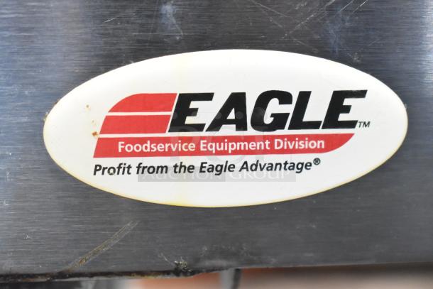 Eagle stainless steel 3 bay steam table with metal under shelf. Features Eagle logo and slogan. Used condition.