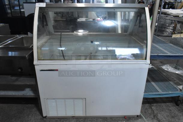 Kelvinator commercial ice cream dipping cabinet, metal, 115 volts, single phase, good condition, front glass display.