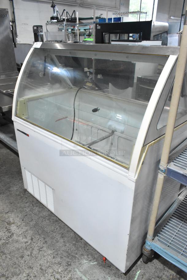 Kelvinator metal commercial ice cream dipping cabinet, 115 volts, 1 phase, white exterior, glass display, used condition.