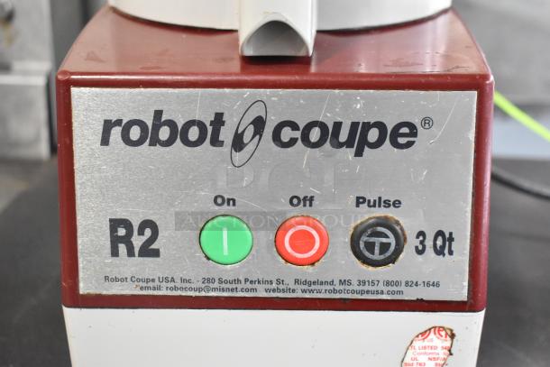Robot Coupe R2N metal food processor, S blade, 120V, 1 phase. Features on/off/pulse buttons, 3 qt capacity. Visible wear.