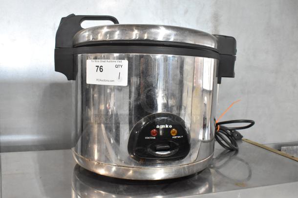 Amko AK-60ERC Metal Countertop Rice Cooker, 115V, 1 Phase, shiny finish, with cooking and keep-warm indicators.