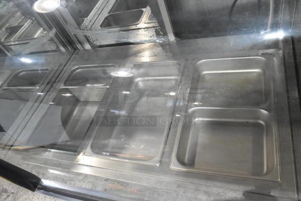 Marc Metal Commercial Heated Display Case, stainless steel, multiple trays, good condition, perfect for food merchandising.