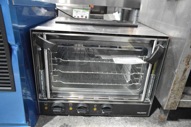 Brand new Vollrath COV-120-HS stainless steel countertop convection oven, electric-powered, 120V, with minor scratches.