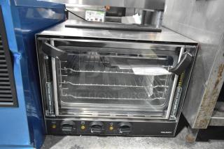 Brand new Vollrath COV-120-HS stainless steel countertop convection oven, electric-powered, 120V, with minor scratches.