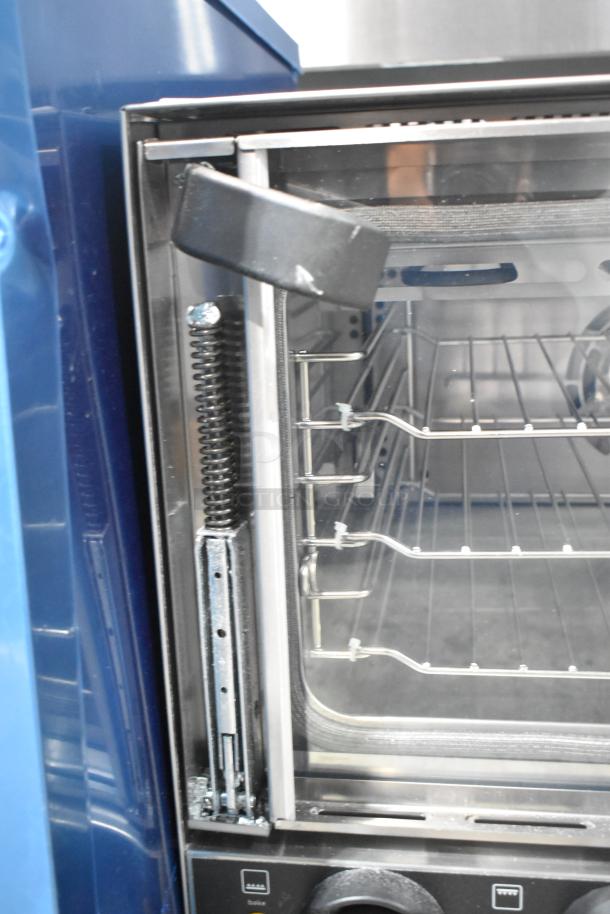 BRAND NEW Vollrath COV-120-HS stainless steel convection oven, 120V, 1 phase. Scratch and dent condition. Interior shelves visible.