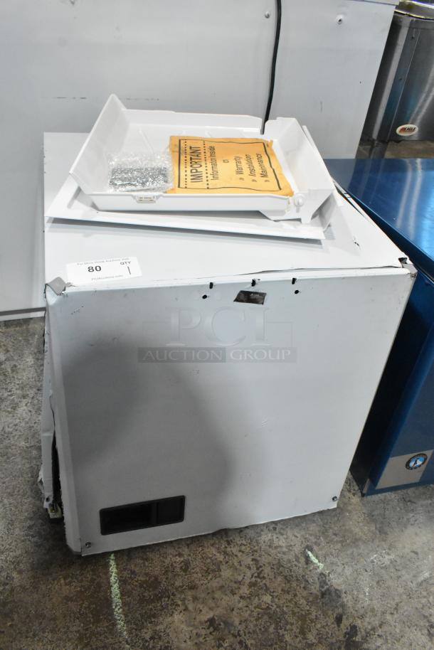 Brand new Scotsman MC0522SW-32A ice machine, 2024 model, 480 lb capacity, stainless steel, visible scratches and dents.