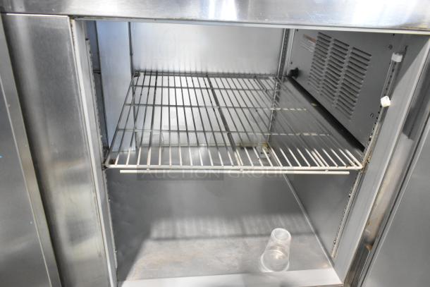 Beverage Air UCR67A stainless steel 2-door undercounter cooler, commercial casters, 115V, 1 phase, interior shelf shown.