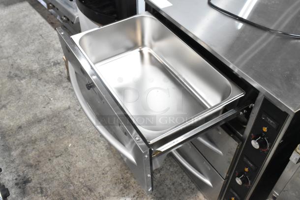 BRAND NEW 2024 ServIt 423WDSFS3 stainless steel triple drawer warmer, 120V, 1 phase, with scratch and dent marks.