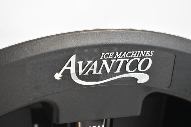 Avantco 194HBN12022 stainless steel ice dispenser close-up, showing brand logo, 120 lb. capacity, new condition with minor scratches.