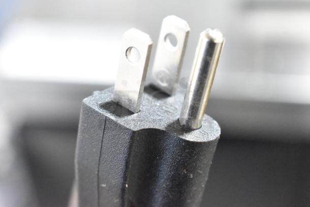 Close-up of power plug for VitaMix VM0805B Mix'n Mixer, showing standard three-prong design for 120V connection.