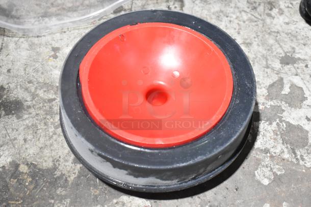 Two brand new Sioux Chief T-Cone raised-head pipe barrel plugs in red and black, visible markings, 6" and 8" sizes.
