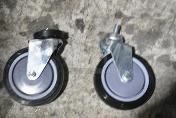 Brand new Regency 5" poly fixed and swivel casters, ideal for 6.3/8.5 cu. ft. shopping carts, two items included.