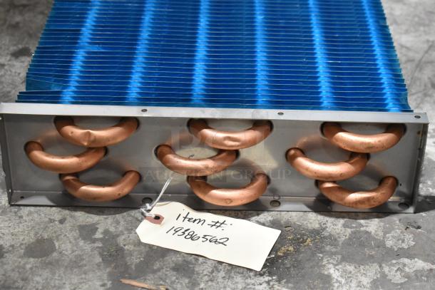 Brand new Avantco 19386562 evaporator coil for VAC-36W and VAC-36B; visible item tag with number 19386562.