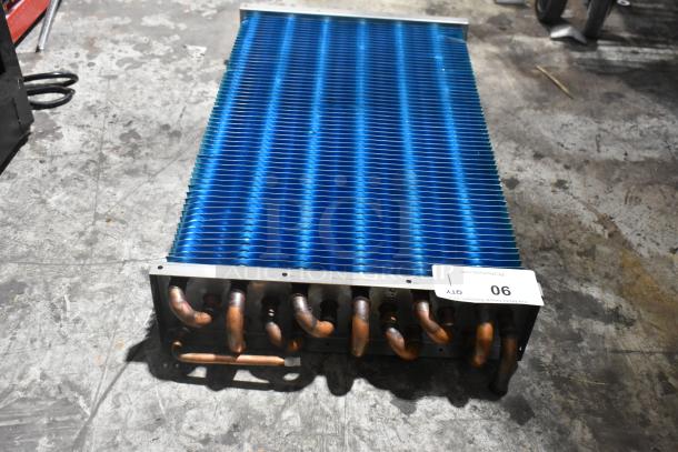 Brand new Avantco 19386562 evaporator coil, compatible with VAC-36W and VAC-36B models, showing scratch and dent.