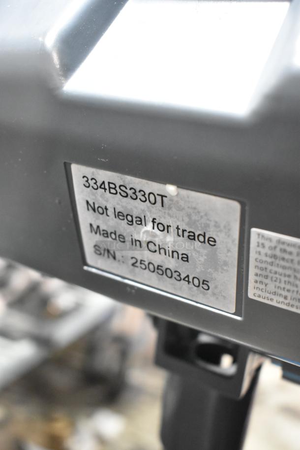 BRAND NEW SCRATCH AND DENT! AvaTek 334BS330T 330 lb. digital bench scale with tower display. Label reads: "Not legal for trade. Made in China. S/N: 250503405."