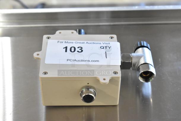 "New scratch and dent box with connector, item 103, labeled by PCI Auctions. Visible minor wear on casing."
