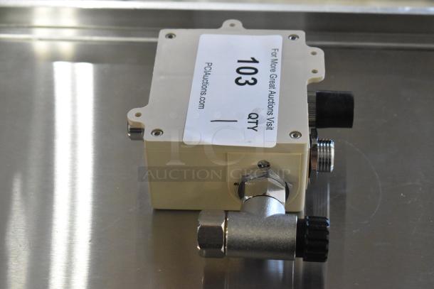 New scratch and dent box, beige with metallic connectors, labeled "103" from PCIAuctions.com.