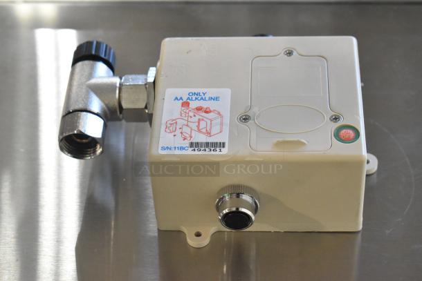 New electronic component with fittings, showing light external wear. Label indicates "Only AA Alkaline." Serial number: 11BC 494361.