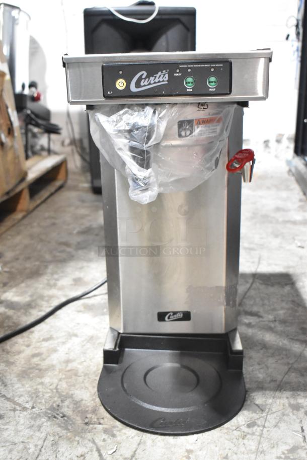 Brand new Curtis TLP12A19 stainless low profile 19" airpot brewer with hot water dispenser, metal brew basket, 120V.