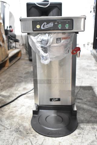 Brand new Curtis TLP12A19 stainless low profile 19" airpot brewer with hot water dispenser, metal brew basket, 120V.