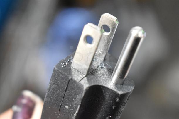 Close-up view of a three-prong plug for the Curtis TLP12A19 Airpot Brewer, indicating 120 Volts, 1 Phase power.