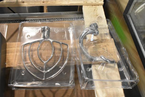 Avantco 177MIX8GY mixer attachments in packaging, including paddle and dough hook. New, scratch and dent condition.