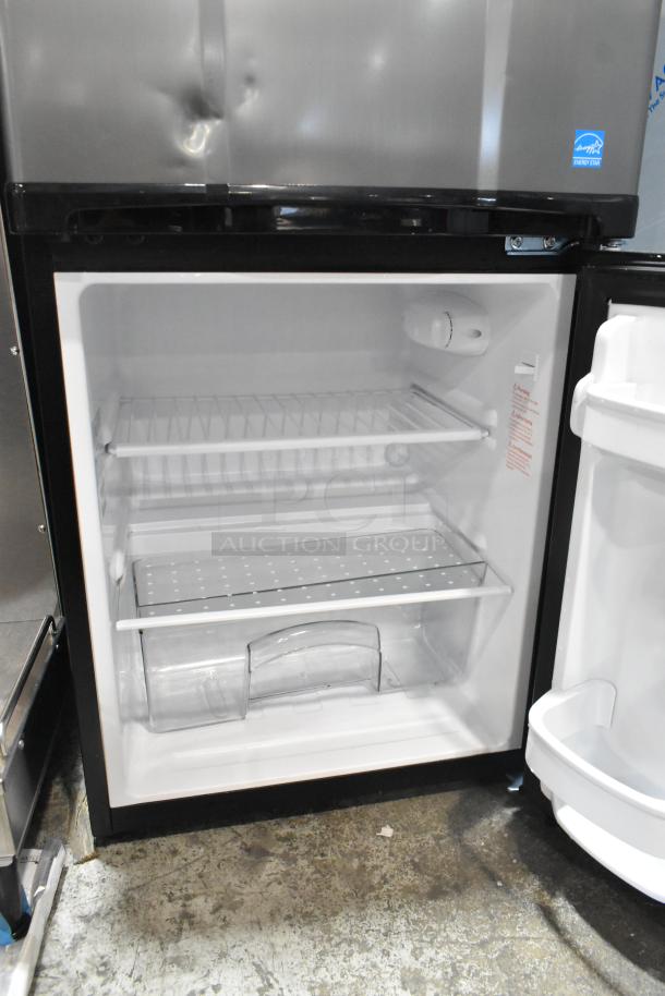 Micro Fridge 3.1MF7RS Mini Cooler with Freezer, 115 volts, 1 phase, includes shelving. Small dent visible on door.