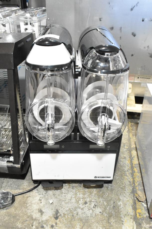 Brand new Stoelting SCBF128-37 metal commercial double 2.6-gallon frozen beverage/granita machine, 115 volts, 1 phase.