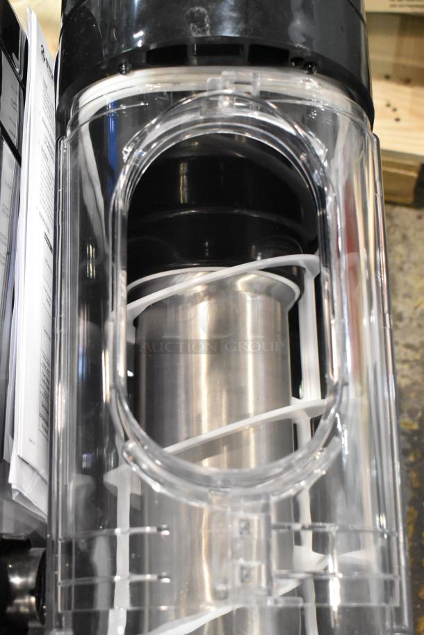Brand new Stoelting SCBF128-37 2.6-gallon metal frozen beverage machine, clear casing, inside crate, 115 volts, 1 phase.