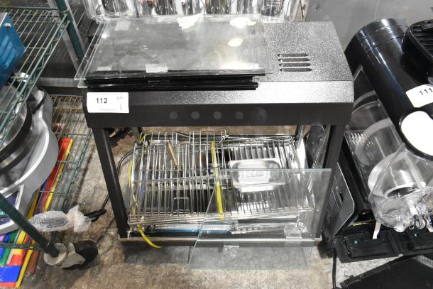 Brand new Avantco 177HDC26 heated display case, 26" with sliding doors, 3 shelves, missing glass, 120V, 1 phase.