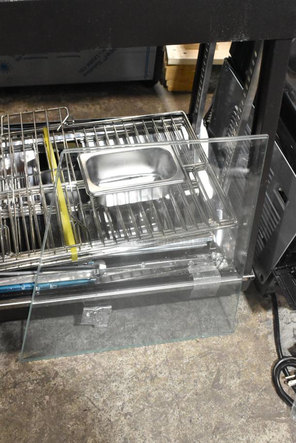 Avantco 177HDC26 Heated Display Case, brand new in crate, 26", 3-shelf, countertop, sliding doors, missing glass panel, 120V, 1-phase.