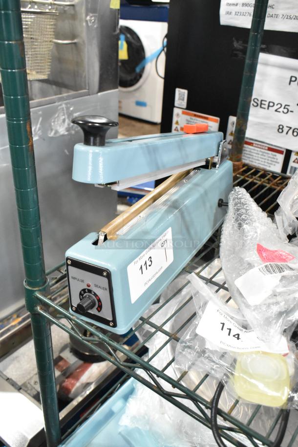 Brand new Hualian FS-200M metal countertop hand impulse sealer with middle cutter, 110V, 1-phase, in crate.