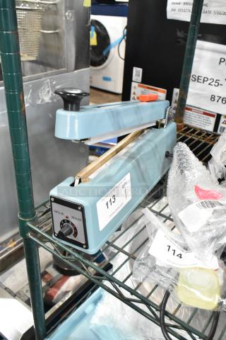 Brand new Hualian FS-200M metal countertop hand impulse sealer with middle cutter, 110V, 1-phase, in crate.
