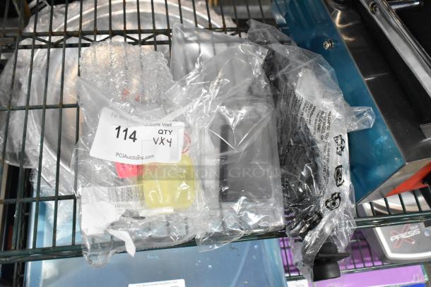 Four brand new items in crate including Bron Coucke 10216 flat cutting blade, Amana 59194649 LED lamp, Estella 34819563005 lubricating oil, and Lavex 12" brush roll. Packaging includes auction tag "114, QTY 4X."
