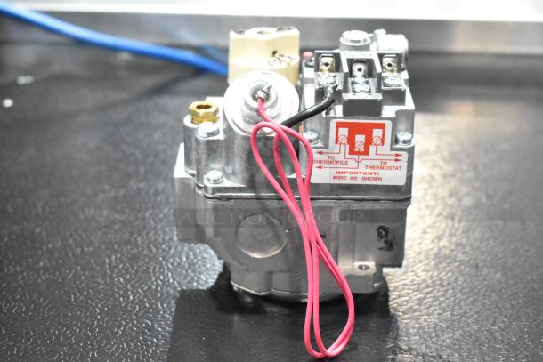 Brand new American Range A37404 Combo Nat Gas Valve, model HPA37404, with visible wiring diagram label.