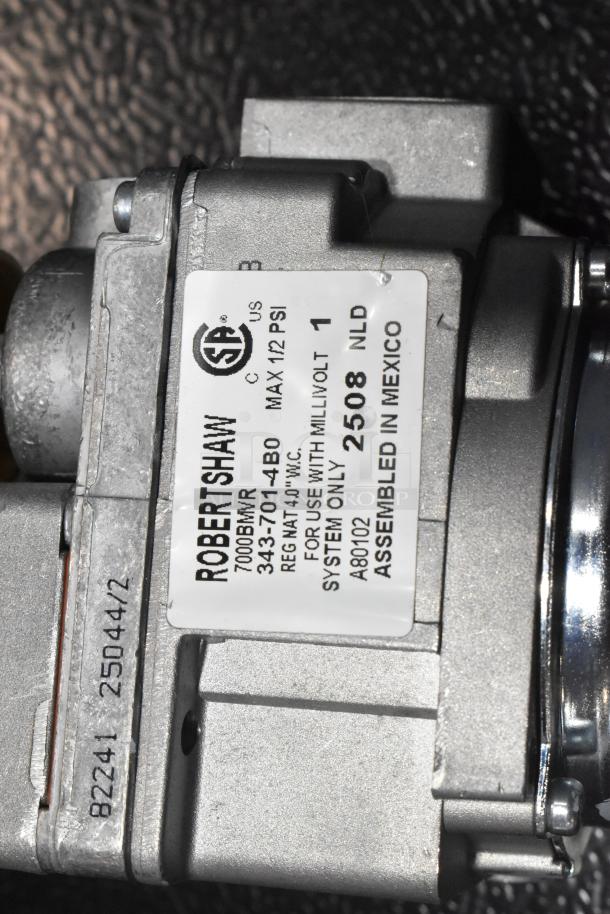 BRAND NEW SCRATCH AND DENT American Range A37404 combo natural gas valve, model HPA37404, Robertshaw label visible.