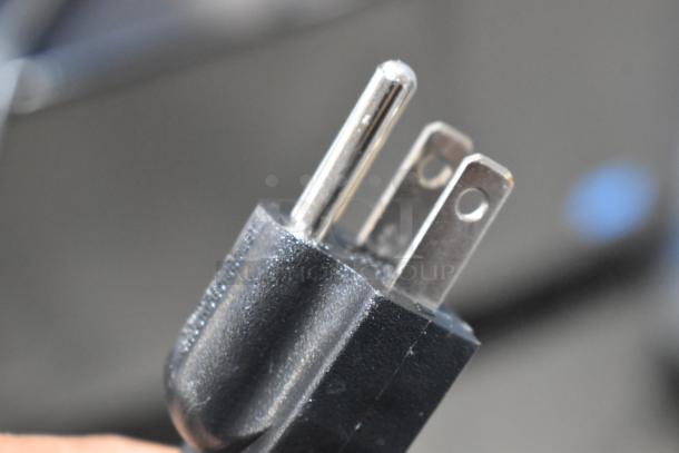 Close-up of a standard plug for the 2024 Bunn OHW Stainless Steel 80 oz. Pourover Hot Water Machine, 120 Volts, 1 Phase.