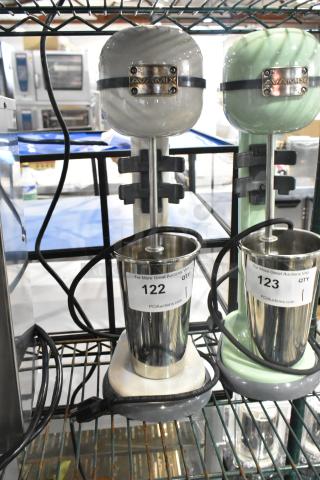 Brand new AvaMix 928RDM1CRM Retro Cream Single Spindle Drink Mixer, 120 Volts, scratch and dent condition, auction tag attached.
