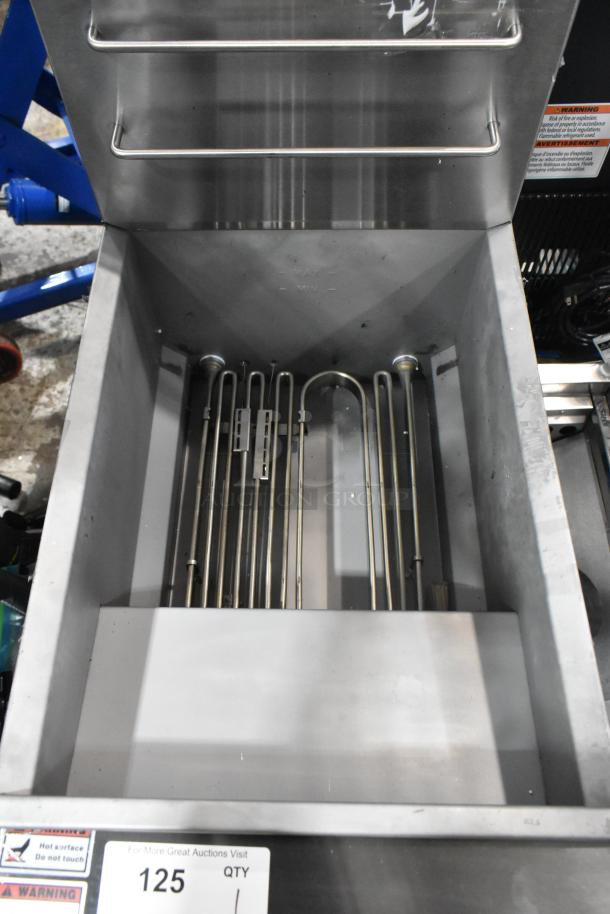 Brand new Avantco 177EF40C electric floor fryer, stainless steel, 40 lb capacity, with two metal fry baskets, 208V, 3 phase.