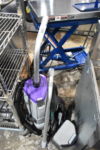 BRAND NEW ProTeam 1076420 Backpack Vacuum Cleaner, purple and gray, scratch and dent, hose and attachments included.
