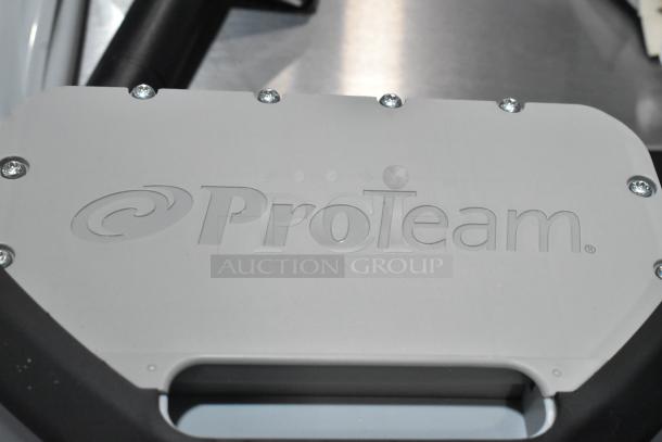 Brand new ProTeam 1076420 backpack vacuum, minor scratches, embossed logo, durable construction, quality performance.