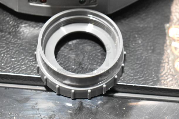 Image showing a component of a ProTeam 1076420 backpack vacuum, highlighting new condition despite minor cosmetic imperfections.