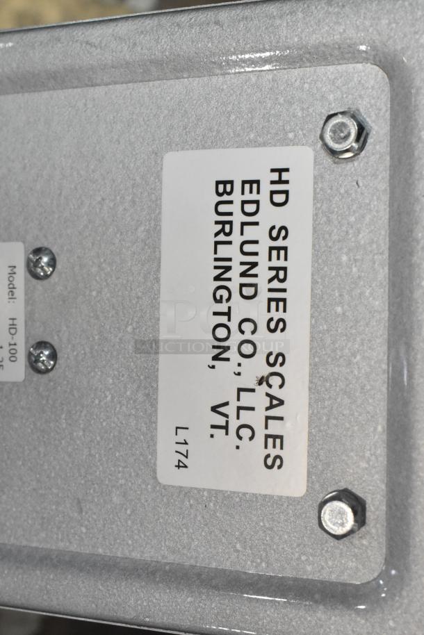 BRAND NEW Edlund HD-100 heavy-duty 100 lb. receiving scale; 12" x 12" platform; scratch and dent; label shows brand and location.