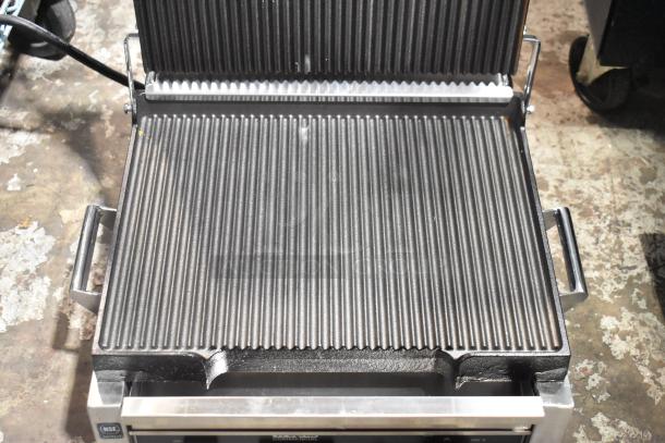 Brand new Waring WPG250T Panini grill; grooved top, smooth bottom, 14.5"x11" surface, 120V, 1 phase, minor scratches.