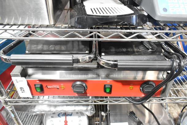 Brand new Avantco 177PG400GS dual panini grill, grooved top, smooth bottom, 19 5/8"x9 1/8" surface, 120V, 1 phase.