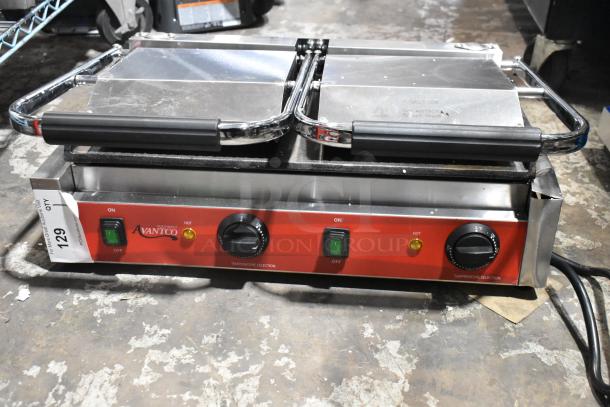 Brand new Avantco 177PG400GS dual panini grill; grooved top, smooth bottom plates, scratch and dent, 19 5/8" x 9 1/8" surface.