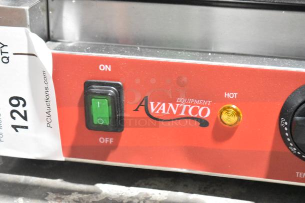 Brand new Avantco 177PG400GS dual panini grill, grooved top, smooth bottom, 19 5/8" x 9 1/8" surface, 120V, scratch and dent.