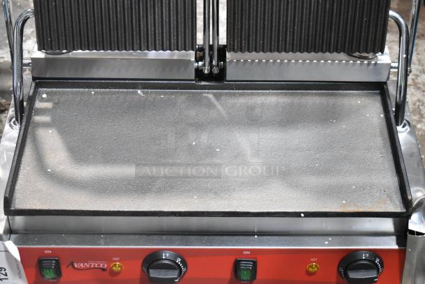 Brand new Avantco 177PG400GS commercial dual panini sandwich grill, grooved top, smooth bottom plates, 19 5/8" x 9 1/8" surface, 120V.