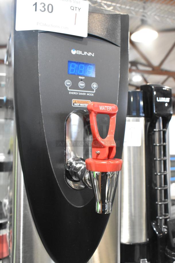 Brand new Bunn H5X 5-gallon hot water dispenser in stainless steel, model 43600.0002, 208V, with temperature control.